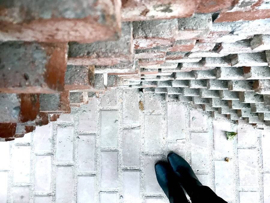 Parametric red-brick facade detail of the MS-II Restaurant, showing ripples formed by staggered brick layers.