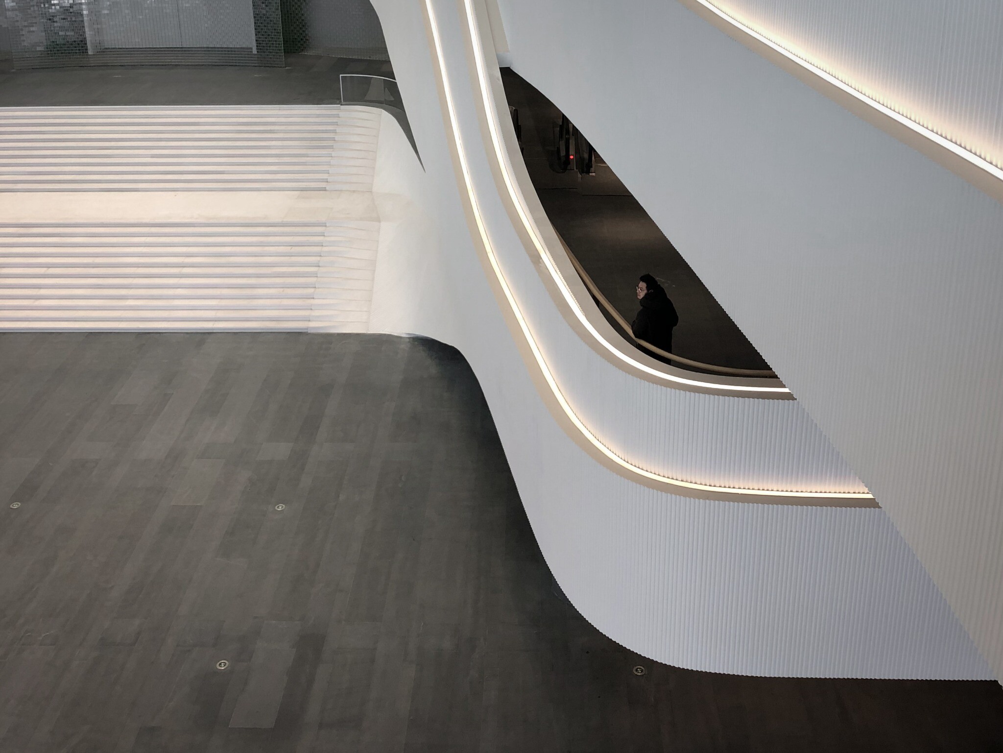West Wing Art Museum atrium stair and exhibition circulation.