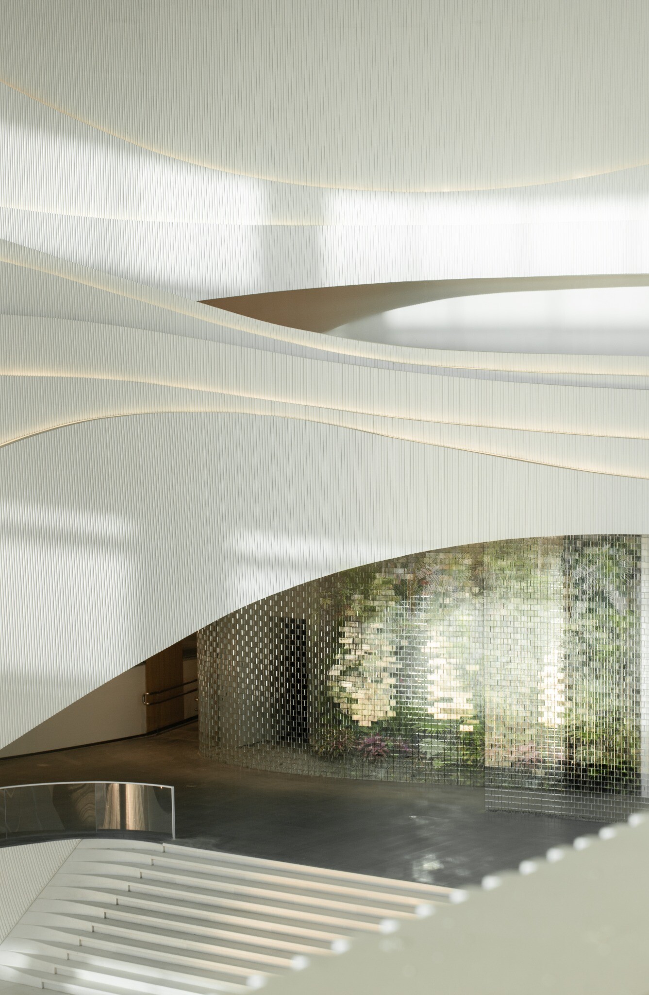 West Wing Art Museum glass-brick screen with natural landscape beyond.