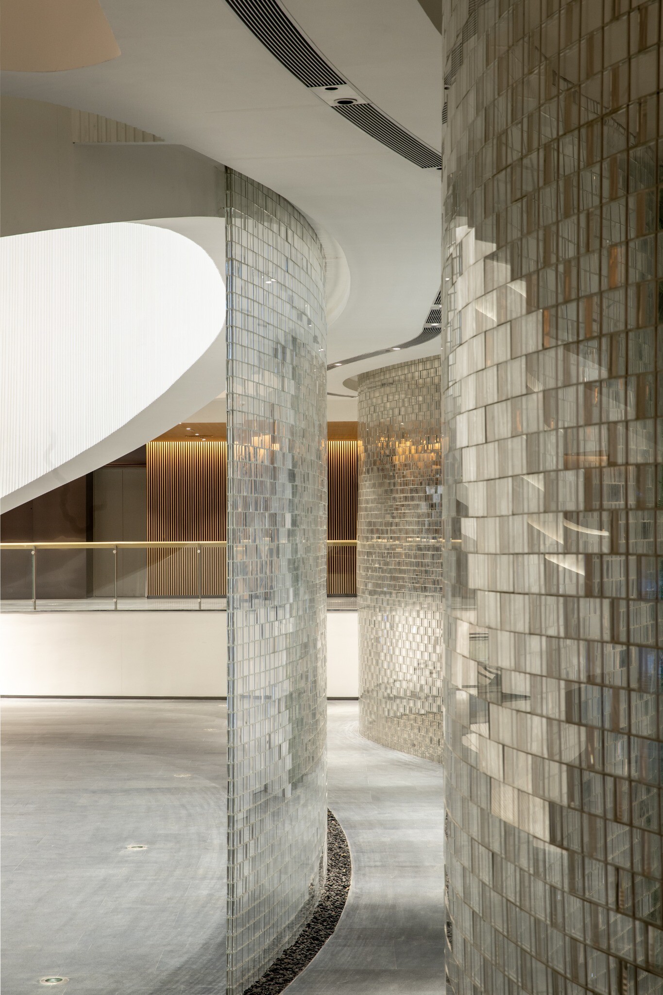 West Wing Art Museum glass-brick partition and interior circulation.