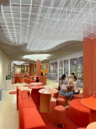 Parent-child lounge where adults and children can stay together within an open learning setting.