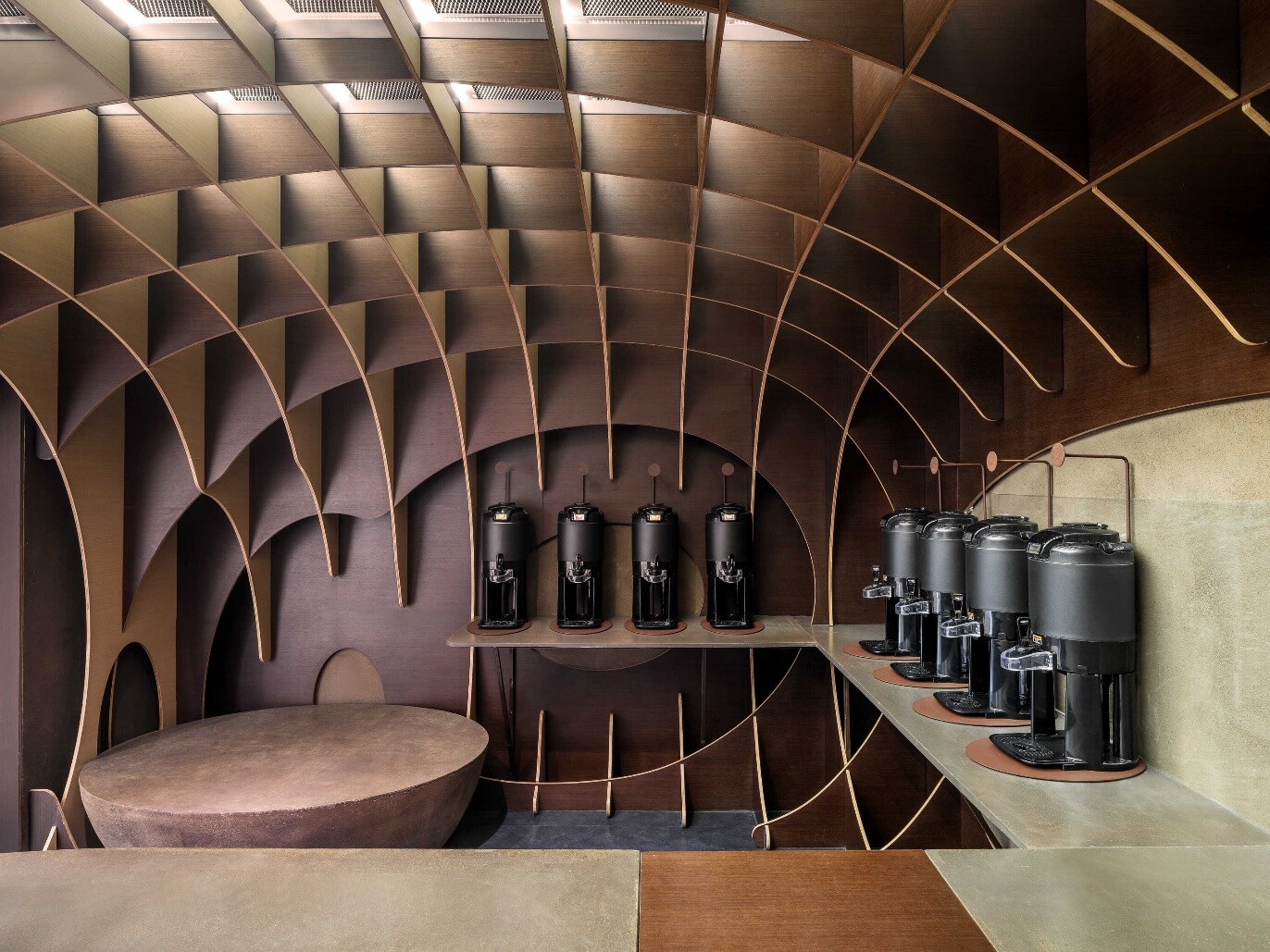 Equipment wall and dark spatial interface of the black coffee zone, emphasizing a strict, precise, and minimal brand character.