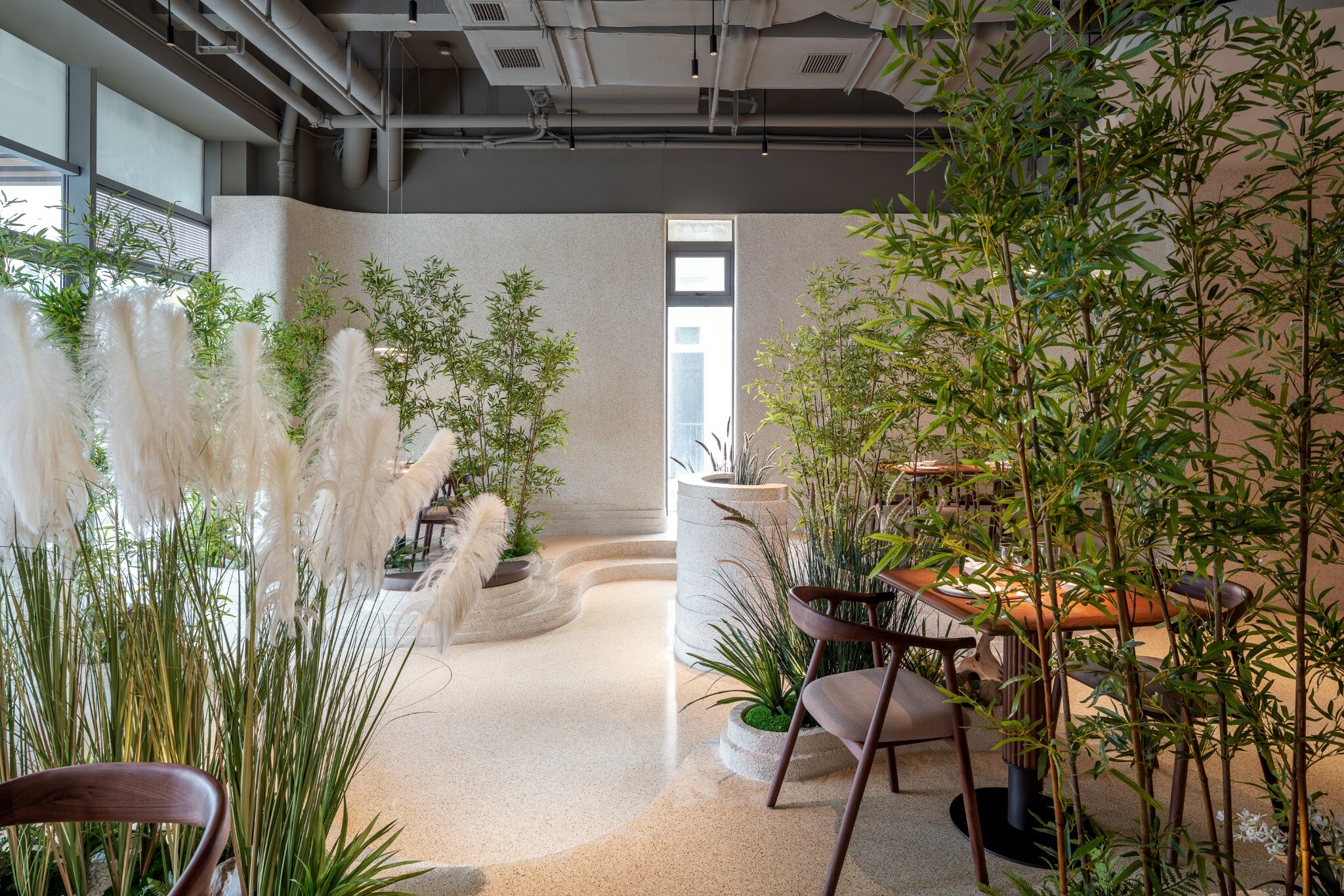 Bamboo screen in the second-floor dining area of YiXing YU Restaurant, providing natural privacy for dining tables.